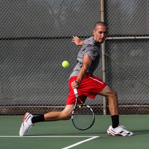 Palomar tennis player Evan Davis won his singles match against Palomar's guest San Diego City College on Feb 19. Dirk Callum/The Telescope