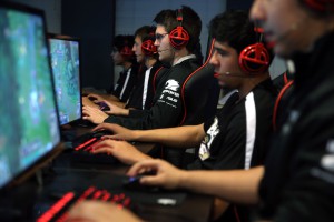 Austin Stadler, center, of Robert Morris University's varsity video gaming team, practices in Chicago on Monday, Oct. 13, 2014, in advance of their first competition. Photo courtesy by Terrence Antonio James/ MCT)