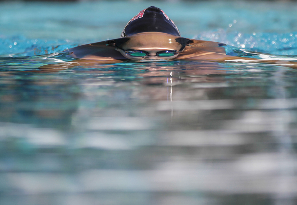 Palomar’s Lacy Gates swims the 1000 yard freestyle race held Friday 20 March at the Wallace Memorial Pool against visiting Mesa College.  The Comets women’s swim team beat the Olympians womens team 137-129, while the Comets men team lost 151-136. Philip Farry / The Telescope.