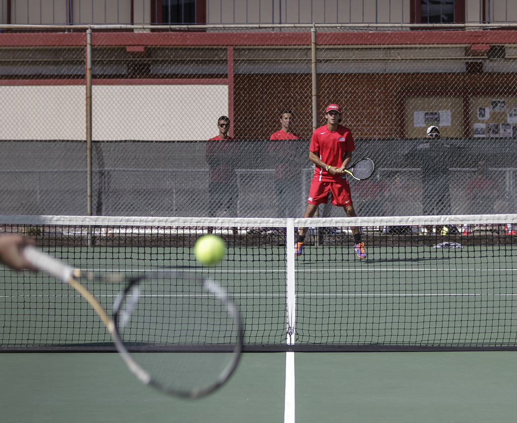 Palomar’s Taylor Bryant waits for College of the Deserts David Bensoussan (not pictured) to hit the ball. Bensoussan defeated Bryant 6-2, 6-4 on Thursday, March 19, 2015. The Roadrunners won the singles matches 6-1. (Philip Farry/The Telescope)