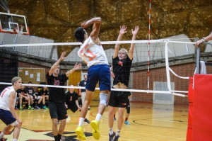 During the third set of the March 11 match against Orange Coast College at The Dome, Sean Keyes (4) goes to block a spike. Seth Jones/The Telescope