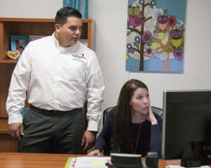 Student Ambassador Edgar Garcia (l) reviews the current schedule with Lisa Filice, acting manager of orientation and follow up services at Palomar.Stephen Davis/The Telescope