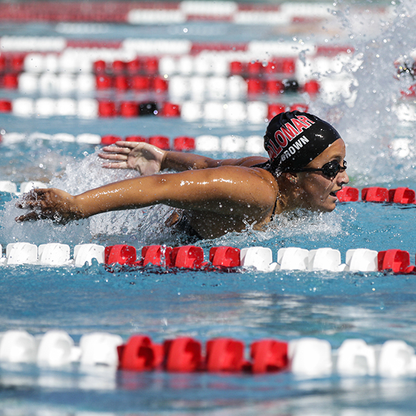 Palomar’s Morgan Brown swims the 100-yard butterfly on the first day of the PCAC Championships held at Wallace Memorial Pool on April 17, 2015. Brown won her heat with a time of 1:07 to advance to the April 18 finals. (Philip Farry/The Telescope)