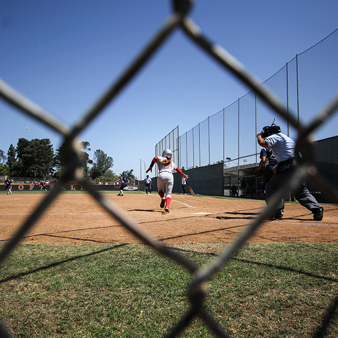 Palomar's Leah Gordon (21) hits a double during the Comets first game of their double header against Cypress College, April 11, 2015. The Comets lost their first game 5-2 and came back to win the second game 3-2. (Dirk Callum/The Telescope)