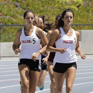 Palomar’s Jessica Betancourt (#1) and Sarah Martinez (#5) led the pack during the the 3000 meter steeplechase, Betancourt won the race with a time of 11:55 and Martinez finished in fifth place. The Comets were participating in  the Pacific Coast Athletic Conference Track & Field Championships on Saturday at Mesa College. Philip Farry / The Telescope.