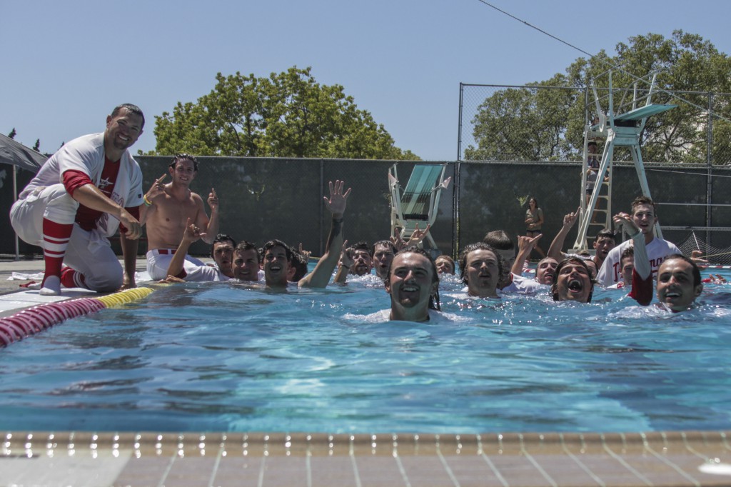Palomar baseball team members celebrate in the Wallace Memorial Pool after The Comets swept visiting Riverside City College on May 2 and advanced to the next round of the Southern California playoffs. Philip Farry / The Telescope