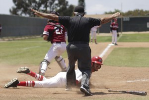The home plate umpire calls Palomar’s Dylan Breault safe in the fourth inning against Saddleback College May 17 at Myers Field. The Comets won 4-3 in 11 innings to sweep visiting Gauchos and advance to the final four to be held in Fresno next weekend. Philip Farry / The Telescope