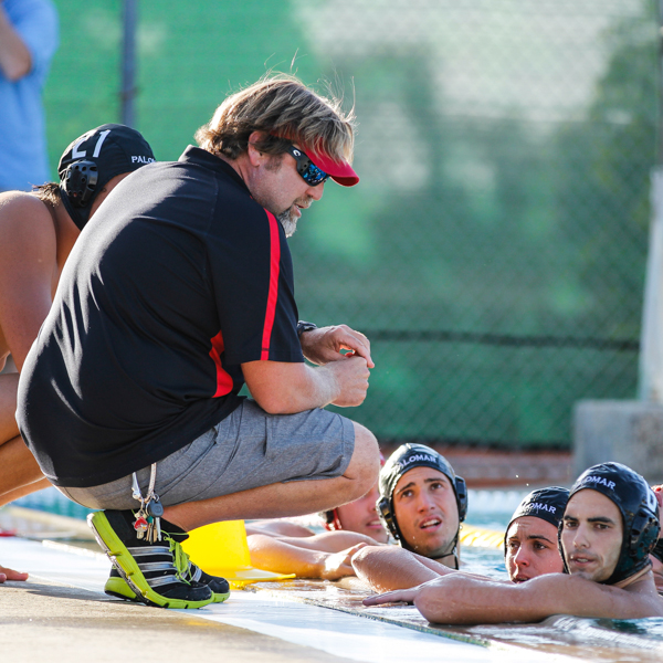 Palomar Coach Chad Aronen with his team during the Oct. 21, 2015 match against visiting Grossmont College at the Wallace Memorial Pool. Palomar went on to win 19-8. (Hanadi Cackler/The Telescope)