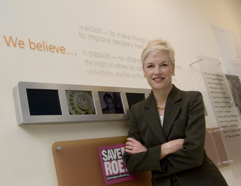 Cecile Richards, the new President of Planned Parenthood, stands infront of a display showing the strides of women's rights, including the company's mission statement, Wednesday, March 1, 2006, in New York. (Beth A. Keiser/Dallas Morning News/KRT)