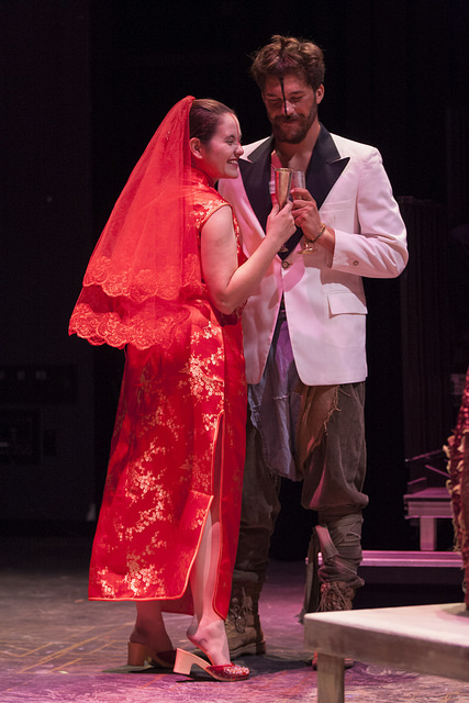 Ingrid Trovão as Shen Te and Anthony Sucari as Yang Sun toast their relationship in 'The Good Person of Setzuan' on Oct. 1 at Palomar's Studio Theatre. Claudia Rodriguez/The Telescope