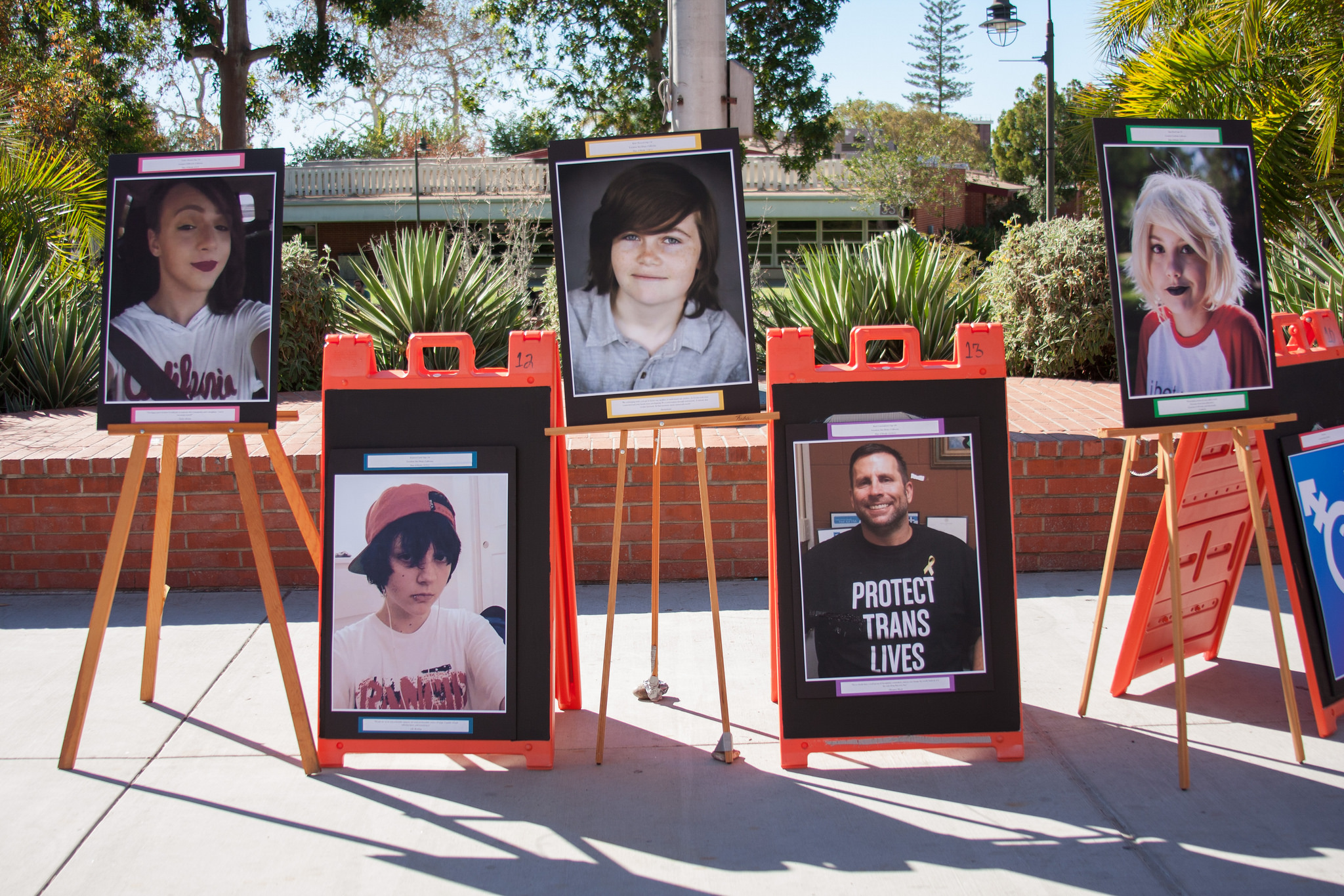 Photographs were displayed in the quad in memory of people who have died as consequence of intolerance toward transgender people. (Claudia Rodriguez/The Telescope)
