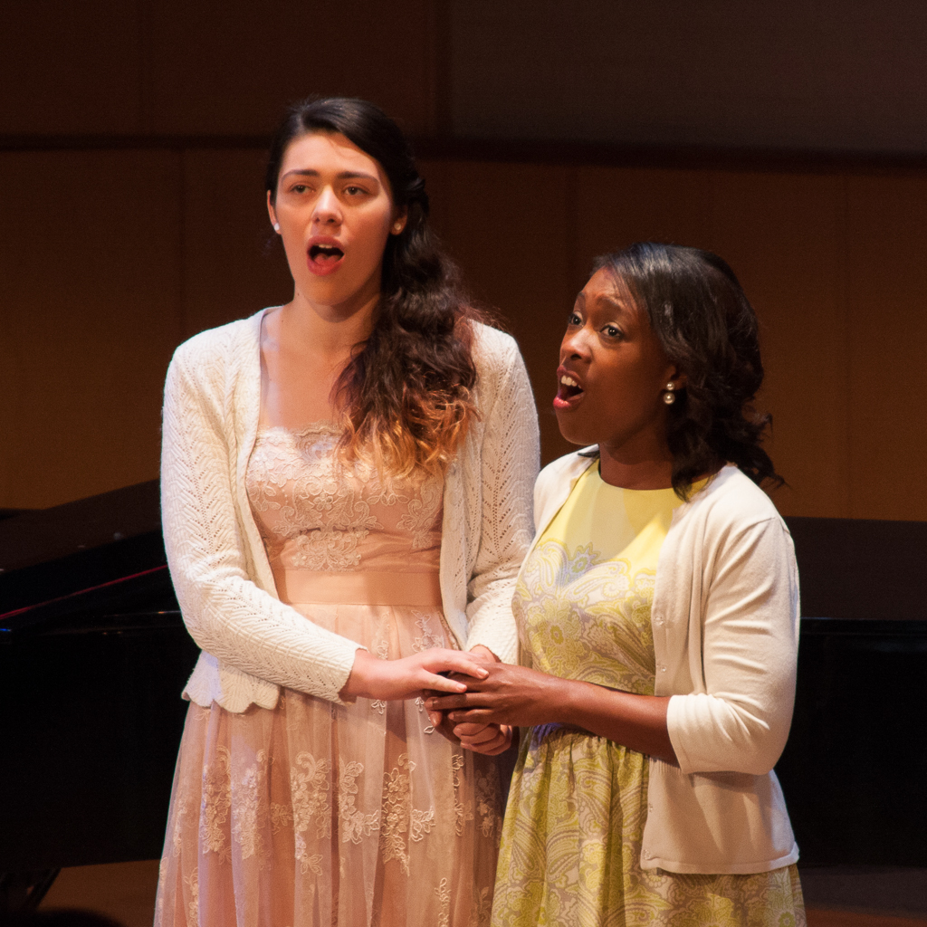 Vocalists, Audrey Lee Young and Clara Vanwinkle Kelly (l-r, foreground), sing part of the "Duo des Fleurs" ("The Flower Duet") from "Lakme." The recital featured six solo instrumentalists, three vocalists, and one jazz quartet. Dec. 3, 2015. (Claudia Rodriguez/The Telescope)