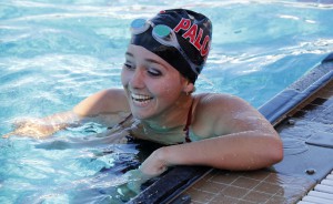 Palomar's Carley Woods is all smiles after winning the Women's 100 yard Breastroke event during the 2016 Waterman Festival Relays at the Wallace Memorial Pool on Feb. 6. Woods swam a time of 1.18.20. Coleen Burnham/The Telescope
