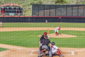 Palomar's Troy Lamparello throws a pitch during the Feb. 23 game against Glendale College. Palomar lost the game 14-6. Hanadi Cackler/ The Telescope