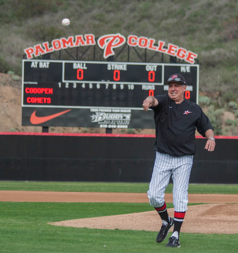 Professor and Baseball Coach Emeritus Bob Vetter (now serving as an assistant coach) throws the first pitch of the 2016 Palomar College baseball season at the new Baseball Field on Jan 27, 2016 as Head Coach Buck Taylor looks on. Vetter was Palomar's head coach until 2005. (Stephen Davis/The Telescope)