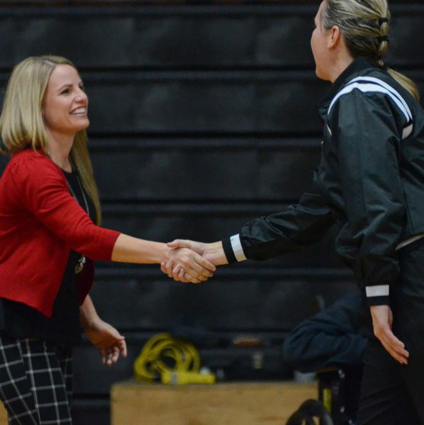 Palomar Head Coach Leigh Marshall shakes hands with a referee before the Southern Regional Playoffs Second Round game vs. College of the Canyons began on Feb. 26, 2016 at the Dome. Palomar won 77-54. (Tracy Grassl/The Telescope)