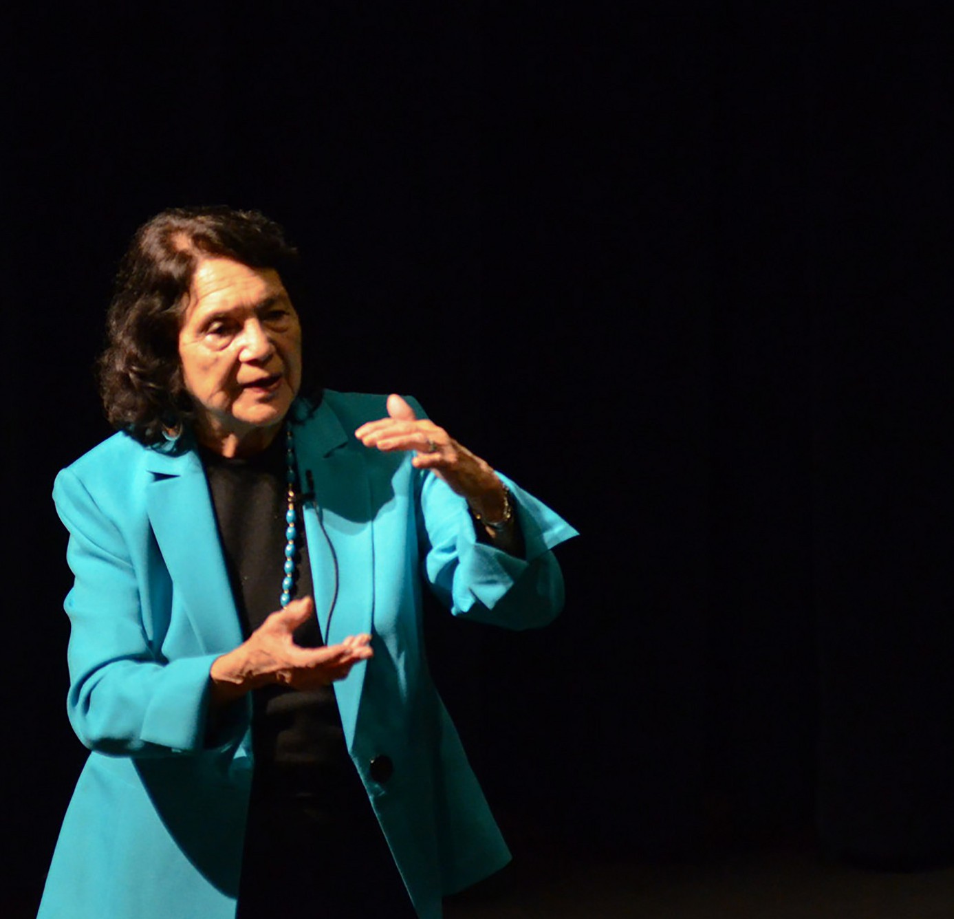 Labor leader and activist Dolores Huerta speaks to her audience about "correcting economic injustice" through her talk, Achieving Equity through Education that was held on campus in the Howard Brubeck Theatre on March 8, 2016. (Tracy Grassel/The Telescope)