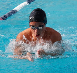 Palomar's Ryan McCauley swims the men's 100-yard Breastroke during the meet against Mesa at the Mesa College Pool on March 4. McCauley placed first with a time of 1.01.93. Coleen Burnham/The Telescope