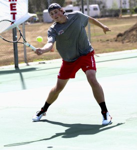 Palomar's tennis player Peter Trhac continues to displays his skills on the court by defeating visiting player Charles Stephen’s of Imperial Valley 6-2, 2-0, No. 1 in singles, March 29, Johnny Jones /The Telescope.