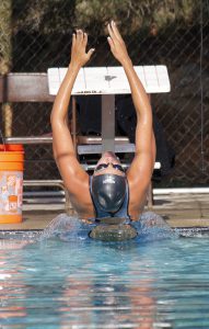 Palomar's Michelle Jacob pushes of the wall to start the Women's 100 Yard Backstroke championship final during the 2016 PCAC Swim Meet on April 22 at the Wallace Memorial Pool. Jacob placed first with a time of 1.01.68. Coleen Burnham/The Telescope