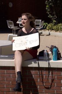  Palomar student Brooke White continues to spread the message to young women students at Palomar College in protest of Anti-Choice promoters on campus, Sept. 14. Michael Schulte/The Telescope 