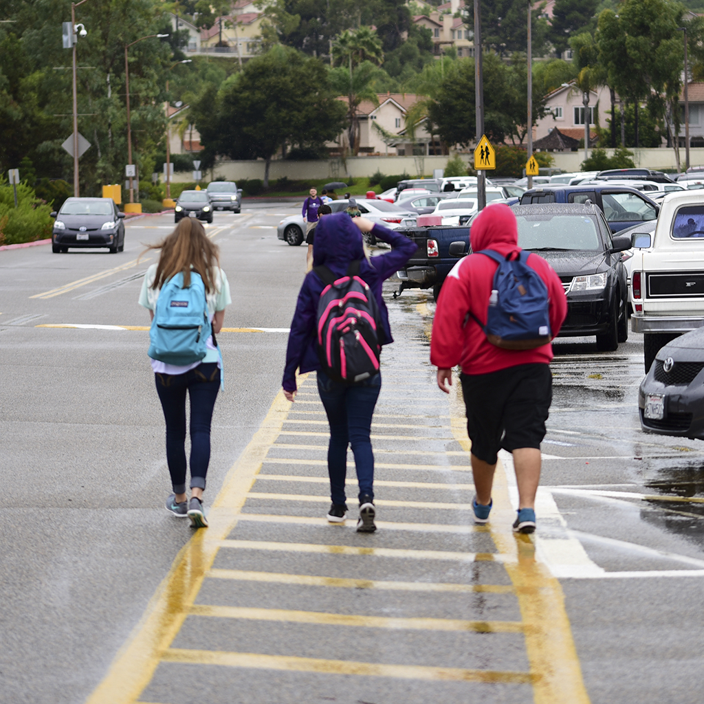 Palomar students find themselves wet while transiting during a rainy Sept. 20, 2016 while on campus. (Johnny Jones/The Telescope)