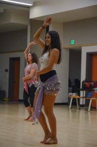 Clarissa Olguin (front) and Bren Hermann (back) have fun while learning to Belly Dance in PAC-215 on Oct. 10. Belly Dancing is listed as Near & Middle Eastern in Palomar's Course Catalog. Tracy Grassel/The Telescope