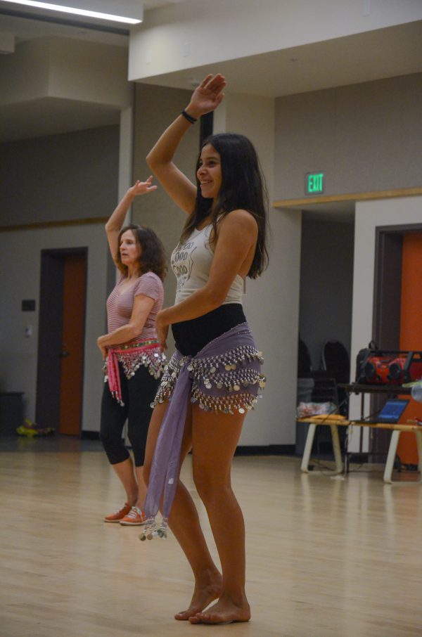 Clarissa Olguin (front) and Bren Hermann (back) have fun while learning to Belly Dance in PAC-215 on Oct. 10, 2016. Belly Dancing is listed as Near & Middle Eastern in Palomar's Course Catalog. (Tracy Grassel/The Telescope)