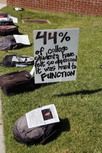 A moving statistic serves to send an important message to college students, part of the 'Send Silence Packing' event at Palomar College on 10/6/16. Michael Schulte/The Telescope