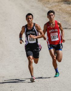 Palomar Freshman Mark Ybarra (606) leads at the half way mark during the Palomar College Cross Country Invitational held at Guajome Park in Oceanside CA on Sept. 9. Ybarra finished third in the race with a time of 20:53.  Philip Farry / The Telescope