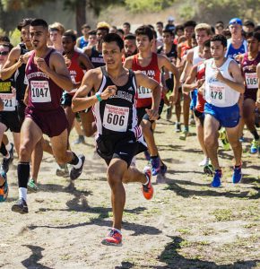 Palomar Freshman Mark Ybarra (606) leads the pack at the start of the Palomar College Cross Country Invitational held at Guajome Park in Oceanside CA on Sept 09. Ybarra finished third in the race with a time of 20:53.  Philip Farry / The Telescope