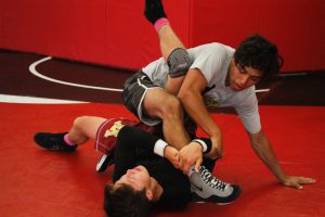 Eric Reyes and Zack Moistner, wrestling during afternoon practice at Palomar Community College on Oct. 3. Idmantzi Torres/ The Telescope