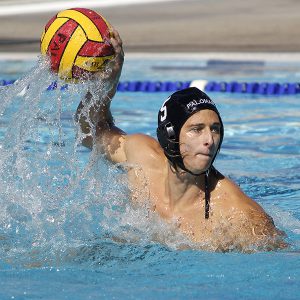 Palomar's Paul Schaner (5) shoots goal 3 for the Comets during the Men's Water Polo PCAC Conference Championship Game between Palomar and Grossmont on Nov. 5 at the Ned Baumer Pool. Schaner tallied 1 goal and Palomar won the title with a score of 10-9. Coleen Burnham/The Telescope