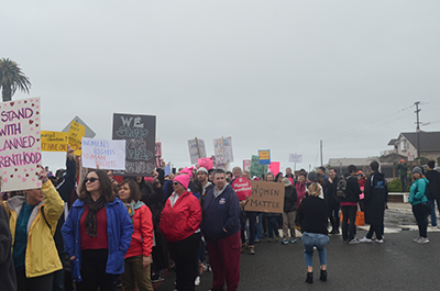 Thousands of peaceful demonstrators walk 2 miles through the streets of downtown Encinitas to show support for Planned Parenthood on February 11, 2017.