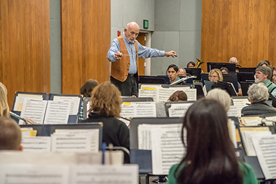 Kenneth Bell conducts the Palomar/Pacific Coast Concert Band during a rehearsal on Feb. 16, 2017 for their upcoming performance at Palomar College.  Joe Dusel /The Telescope.