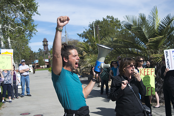Peter Jon Mueller and Shannon Lienhart chant “Not my Palomar” in a protest against Dean Syed “Khalad” Hussain on March 14, 2017. (Jacob Tucker/The Telescope)