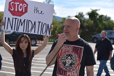Michael Mufson speaks at a rally at Palomar College on March 14. Christopher Jones/The Telescope