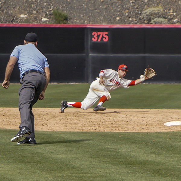 Palomar shortstop Jared Montoya makes a diving stop to record the force out at second base to end the top of the seventh inning. The Comets hosted the Mt. San Jacinto Eagles Saturday March 4, 2017 defeated them 11-1. The Comets improved their record to 11-5 (3-0 PCAC). (Photo courtesy of Philip Farry.)
