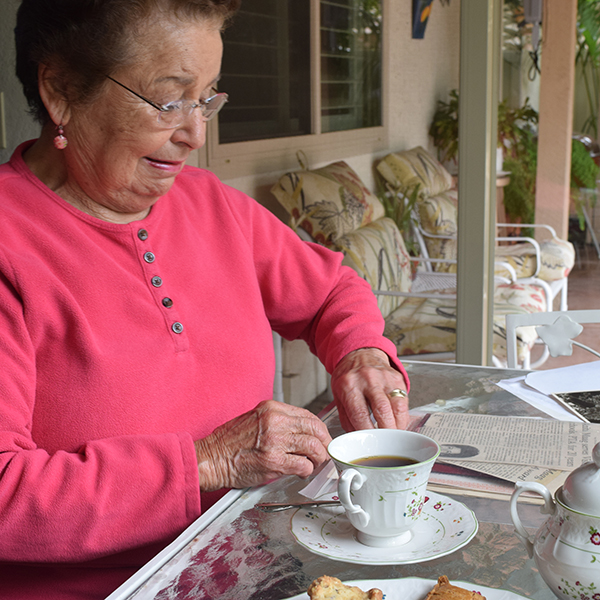 Anita Maag, who graduated from Palomar College in 1949, looks through old memories she’s saved from her time at Palomar College in her Oceanside home on May 10, 2017. (Jacob Tucker/The Telescope)