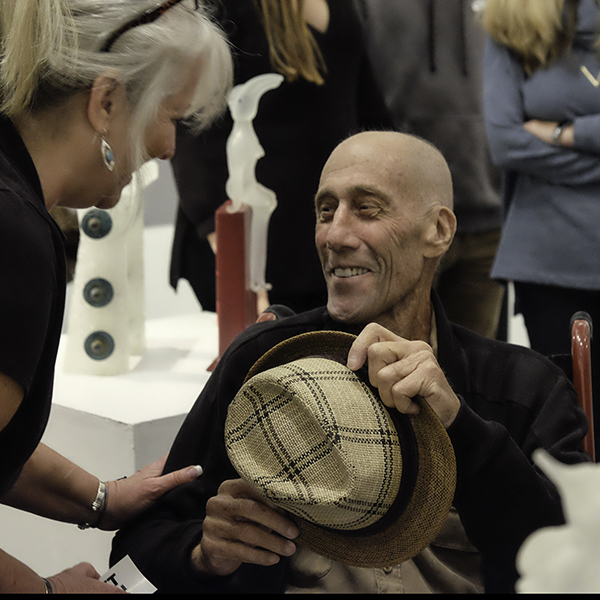 Garry Cohen, longtime teacher and icon of the Palomar Art Department’s glass blowing program, was surrounded by dozens of friends, colleagues, students, and admirers at the opening reception for his show “Journey Through the Burning Sands”, Dec. 1, 2017 at the Boehm Gallery. (Scott Engrav/The Telescope)