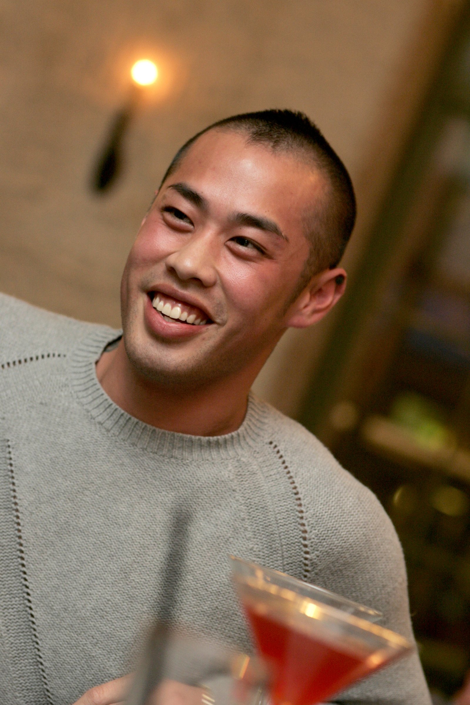 Jason Leong, of Hayward, has drinks with friends at the Village Cafe in San Jose, California, on June 8, 2005. Young, blue collar adults, ages 18 to 25, with tastes for Louis Vuitton bags, tricked-out roadsters and Grey Goose vodka have been described by marketers as the gold-collar generation. (Eugene H. Louie/NC WEB BL/MCT)