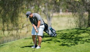 Palomar golf's Jaime Sanz misses the green on the par 3, 7th hole, but sinks the par putt with a nice up and down at Twin Oaks during Wednesday's match.