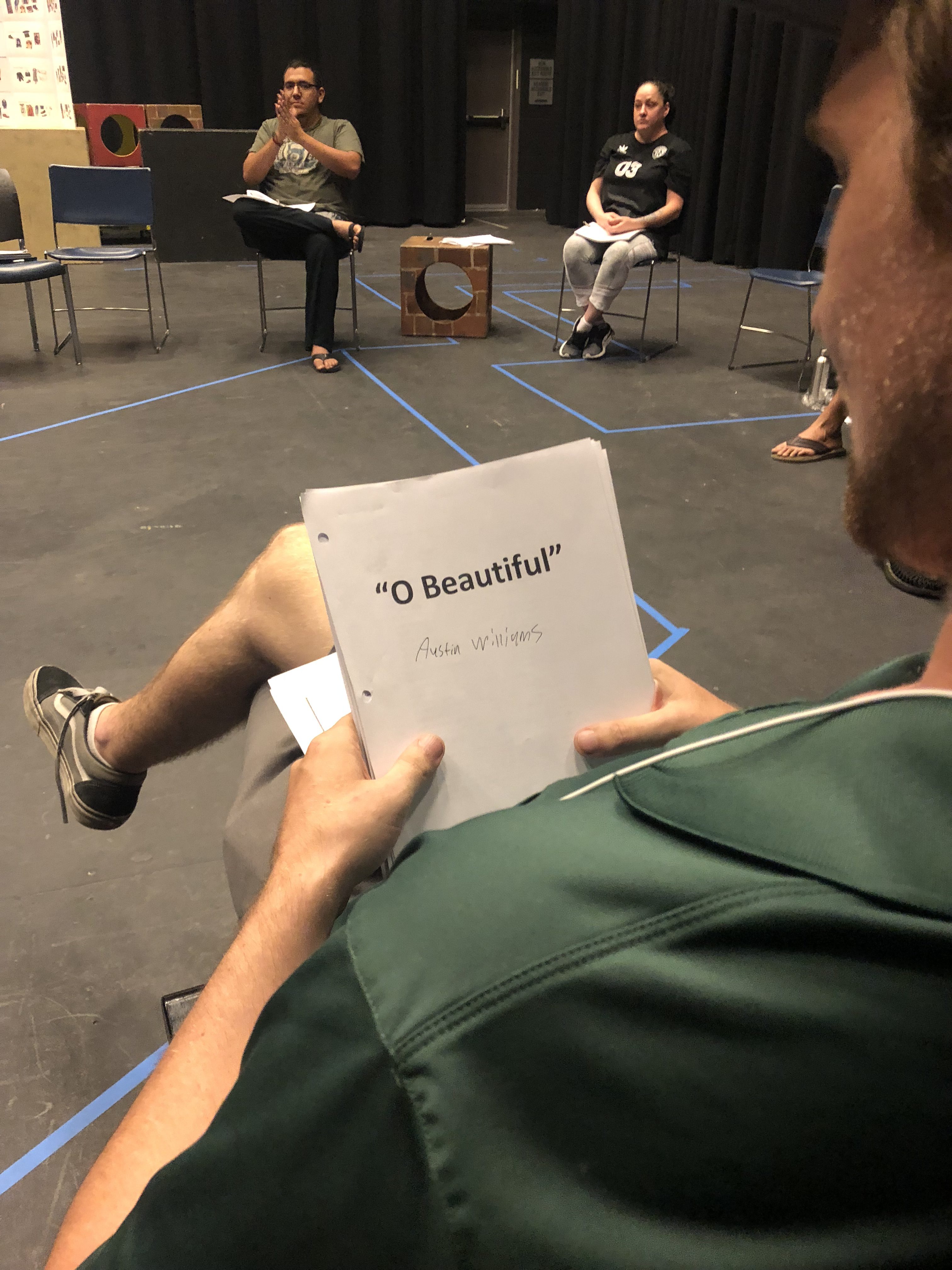 Actor Austin Williams looks over his script for the first time. (Bethany Nash/ The Telescope)