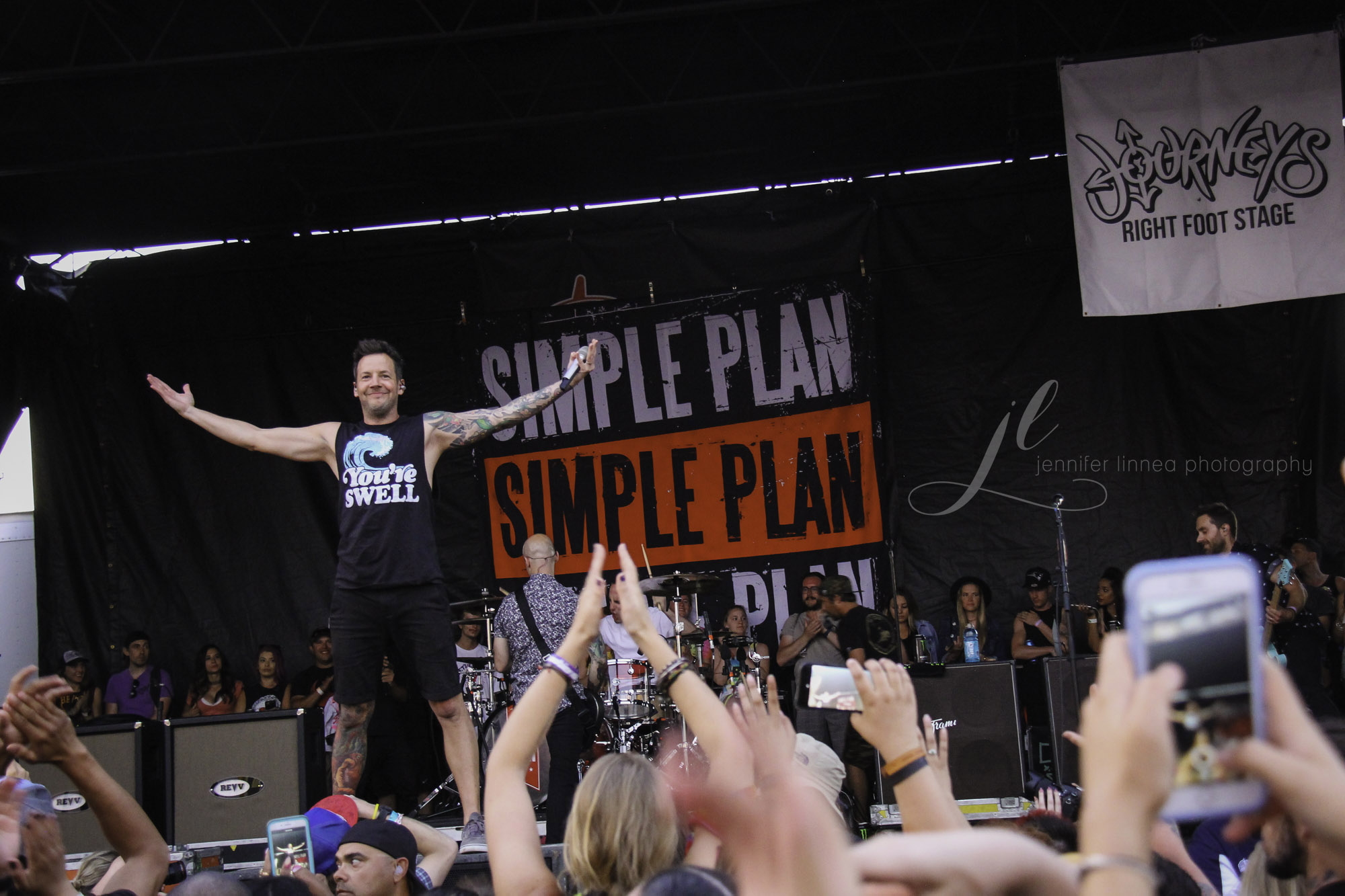 Simple Plan getting the crowd excited at the beginning of their set in Denver, during the 2018 Van’s Warped Tour. Photo courtesy of jenniferlinneaphotography/Flickr