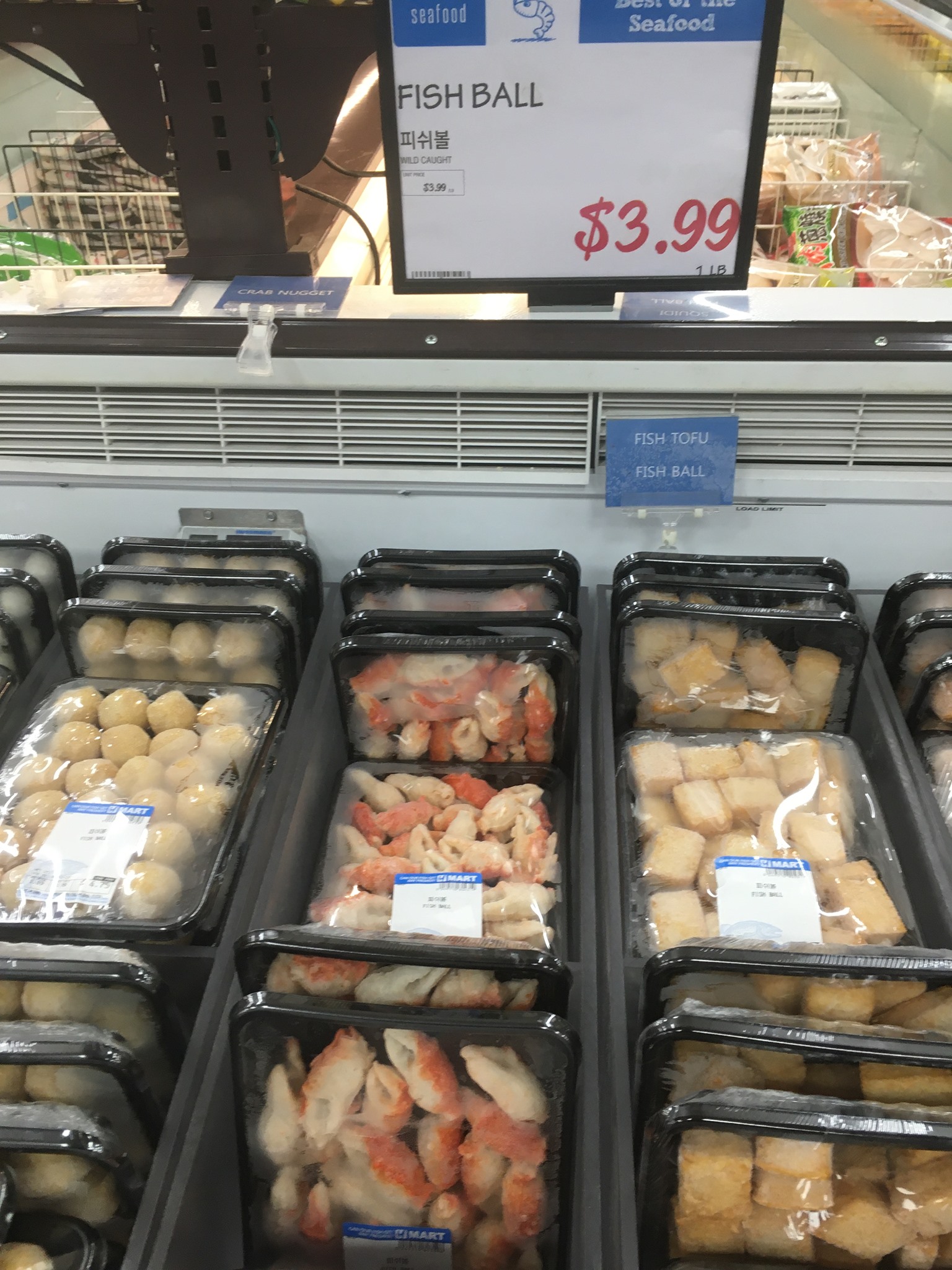 Packaged fish balls and imitation crab meat at a Korean market, sold for $3.99/lb.
