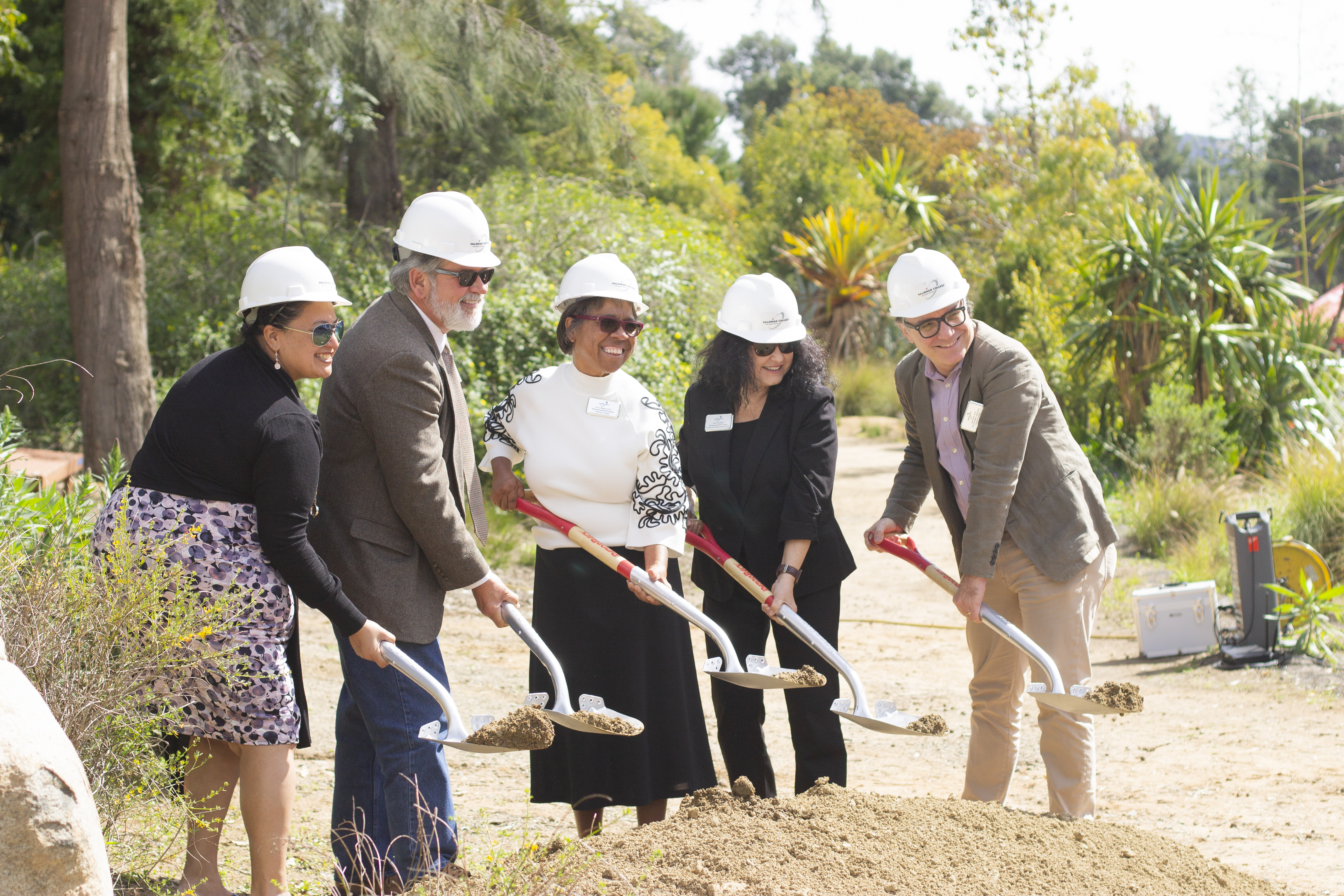 Palomar administrators and Governing Board Trustees at ceremonial groundbreaking event for the Edwin and Frances Hunter Arboretum, March 22, 2019. From l-r: Star Rivera-Lacy, Mark Evilsizer, Join's Lin Blake, Nina Deerfield, Jack Kahn. (Ana Acosta/The Telescope)