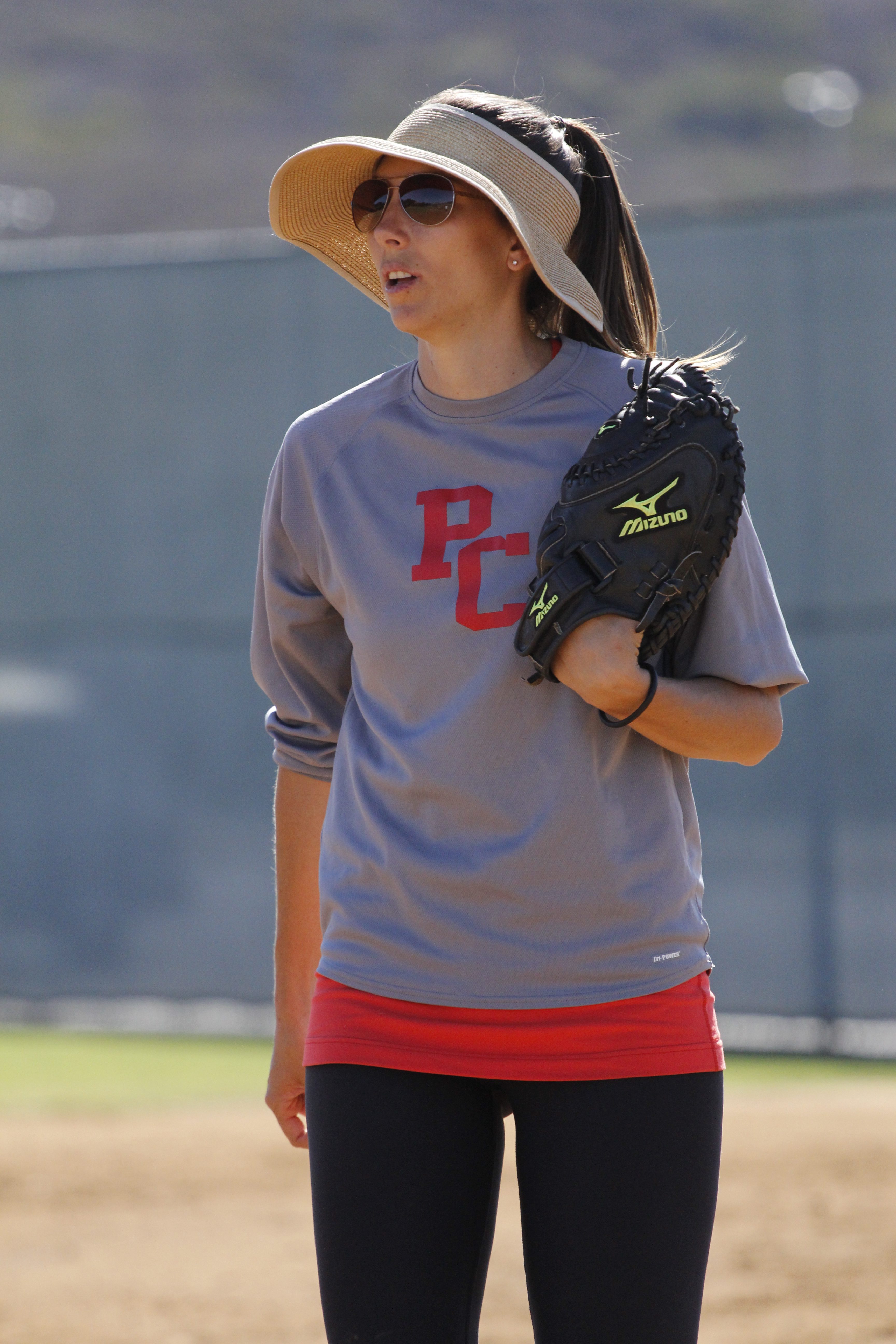 Sept.16, 2013 | Lacey Craft, softball coach, practices with the woman’s softball team at Palomar College’s softball field. (Janet Fry/The Telescope)