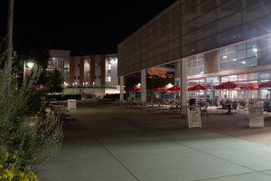 The cafeteria area at night on the main campus with the MD building in the distance. April 10, 2019. Blake Northington/The Telescope.