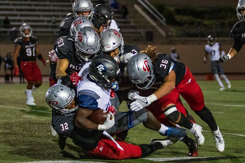 Palomar football’s defense takes down an offensive player during Palomar's game against El Camino College on Nov. 2, 2019. (Kevin Mijares/The Telescope)