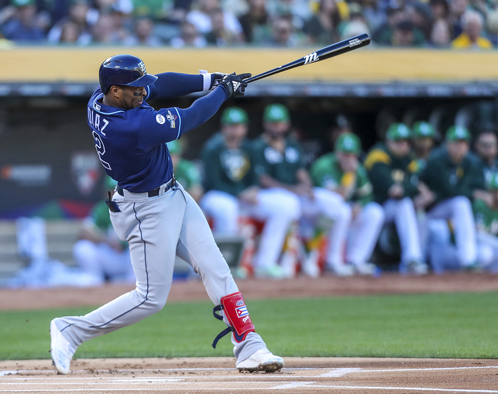 The Tampa Bay Rays’ Yandy Diaz connects for a solo home run in the first inning against the Oakland Athletics in the American League Wild Card game on October 2, 2019, at the Oakland Coliseum in Oakland, Calif. (Dirk Shadd/Tampa Bay Times/TNS)